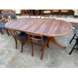 A REGENCY STYLE YEW WOOD CROSSBANDED TWIN PEDESTAL EXTENDING DINING TABLE 64" X 39.5" (LEAF 21.5")