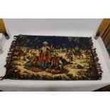 A COLOURFUL EGYPTIAN STYLE RUG WITH CAMELS, FIGURES, DESERT, PALM TREES, ETC, 106CM X 68CM