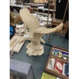 A LARGE RESIN MODEL OF AN EAGLE, HEIGHT 33CM