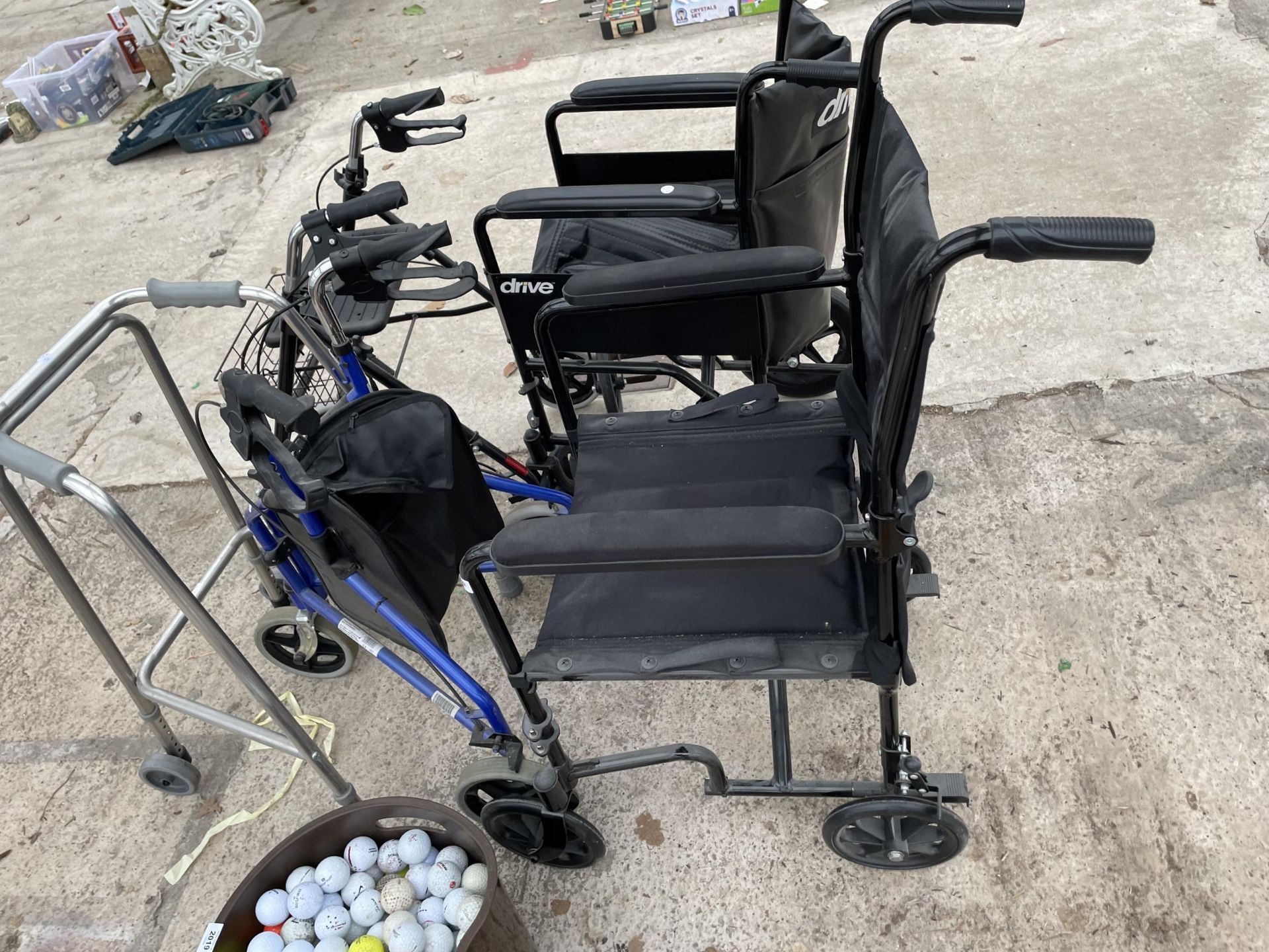 AN ASSORTMENT OF MOBILITY AIDS TO INCLUDE TWO WHEEL CHAIRS AND WALKING FRAMES ETC - Image 5 of 5