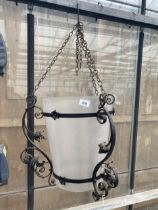 A LARGE VINTAGE FROSTED GLASS LIGHT SHADE WITH METAL DETAIL AND HANGING CHAINS