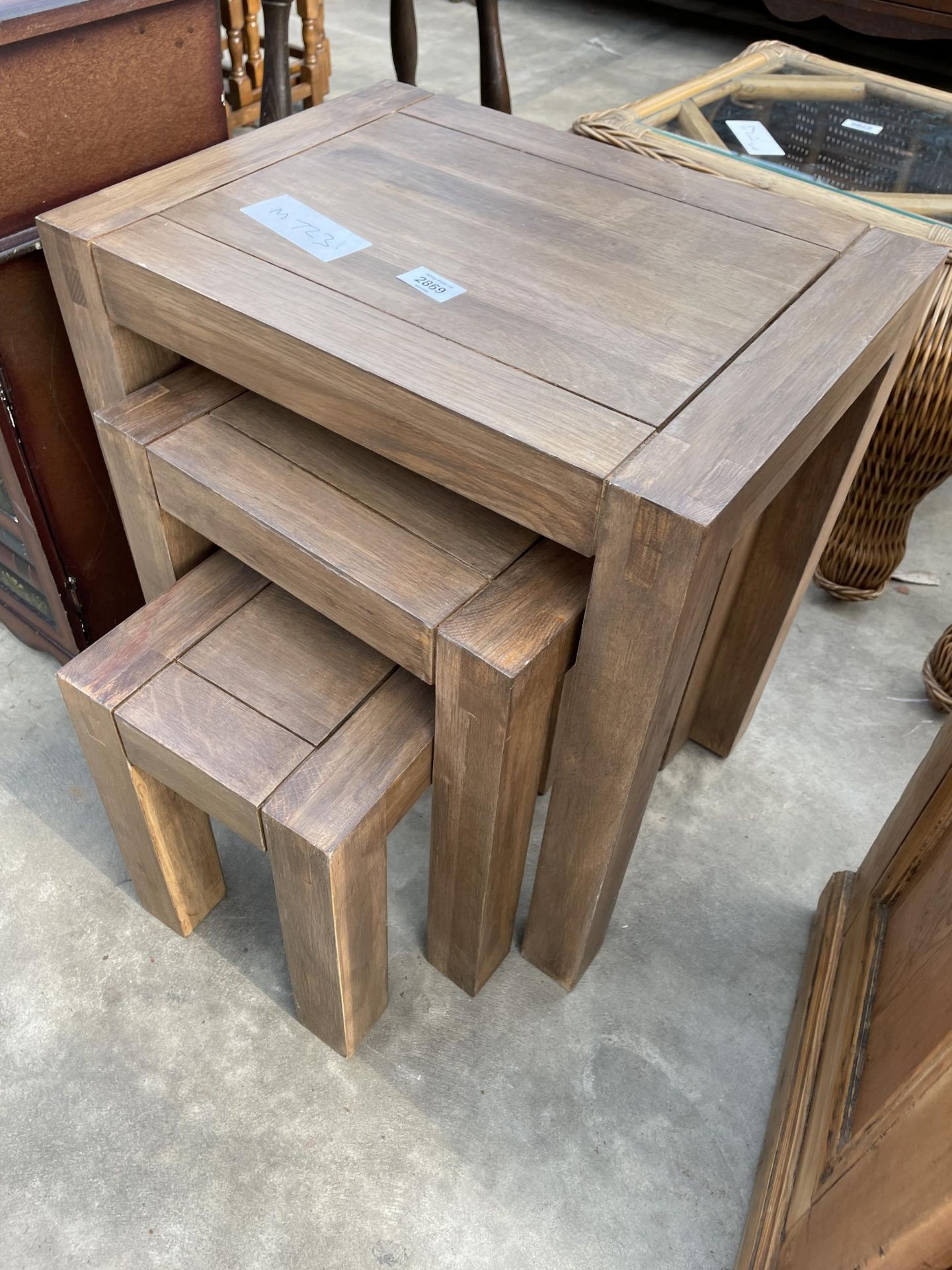 A MODERN NEST OF THREE TABLES AND LI-LO BESDIE LOCKER IN THE FORM OF A STACK OF BOOKS - Image 3 of 3