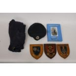 A RAF PULLOVER AND BERET, THREE MILITARY PLAQUES AND A BOOK 'A TRENCHARD BRAT'