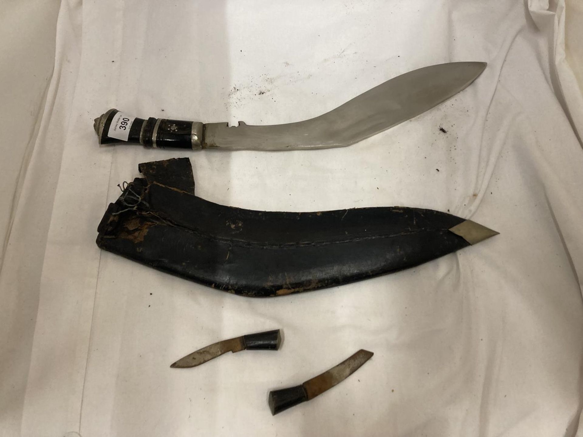 A KUKRI KNIFE AND SCABBARD WITH 36CM BLADE