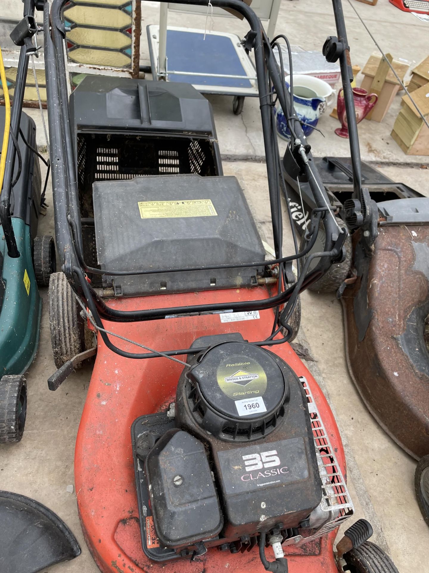 TWO LAWN MOWERS TO INCLUDE A CHAMPION PETROL ROTARY MOWER AND AN ELECTRIC JCB GRASS STRIMMER ETC - Image 3 of 5