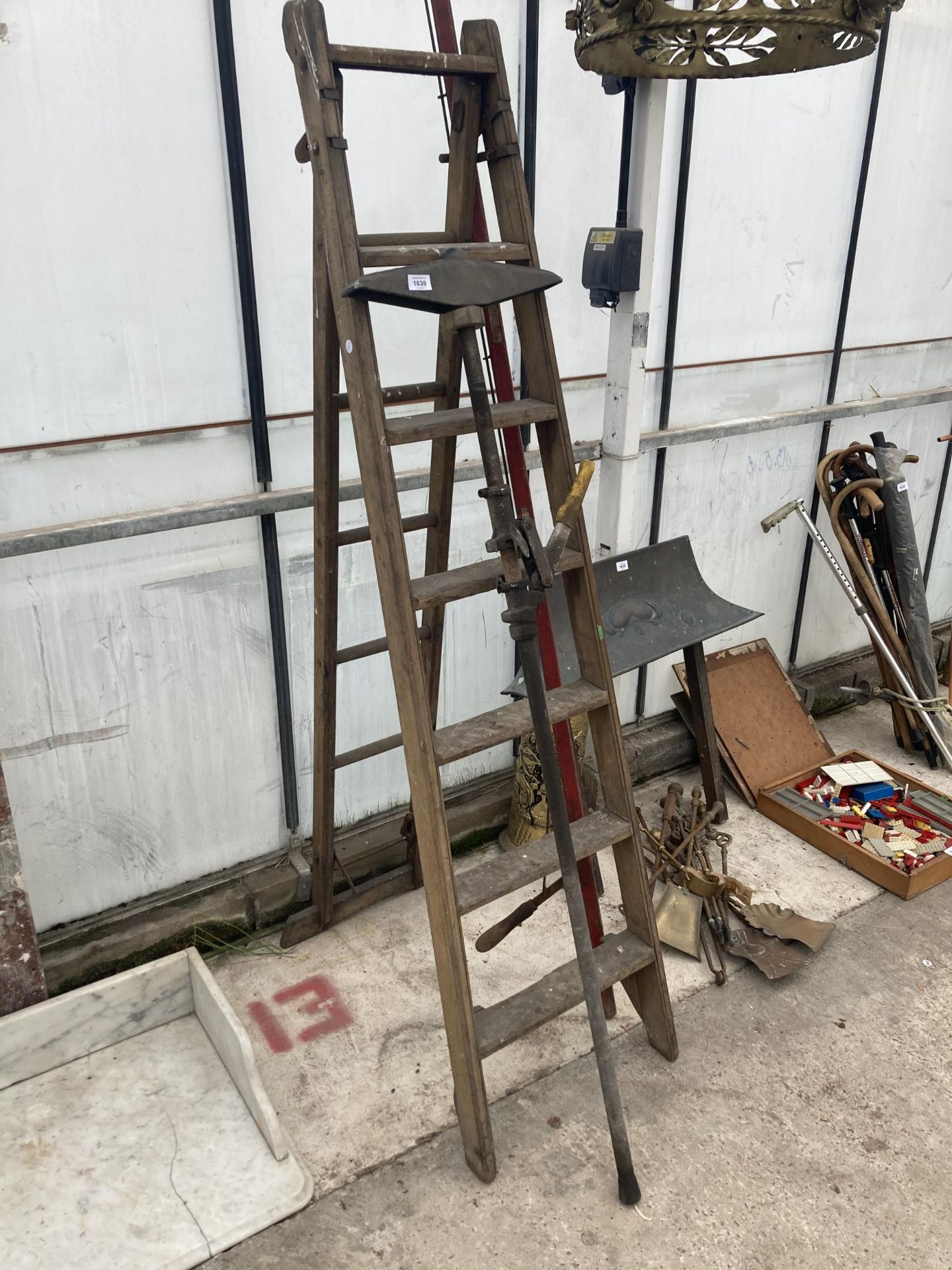 A VINTAGE WOODEN STEP LADDER, A CALVING JACK AND A LONG REACH LOPPER