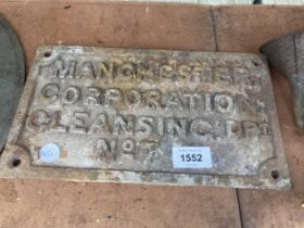 A VINTAGE CAST IRON 'MANCHESTER CORPORATION CLEANSING' WALL SIGN