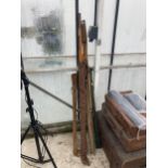 AN ASSORTMENT OF VINTAGE FISHING RODS WITH CARRY BAGS