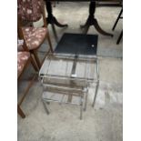 A RETRO OAK LAMP TABLE AND NEST OF THREE CHROME AND GLASS TABLES