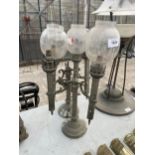 A PAIR OF VINTAGE METAL THREE BRANCH LAMPS