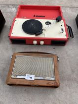 A PORTABLE STEEPLETONE RECORD PLAYER AND A VINTAGE BUSH RADIO