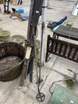 FOUR VINTAGE WOODEN SKIS AND A SET OF SKI POLES