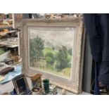 A FRAMED OIL ON BOARD OF A COUNTRYSIDE SCENE, SIGNED, 80CM X 70CM