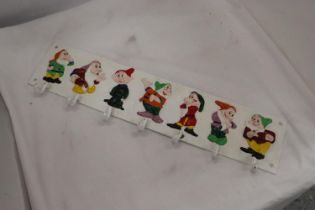 A HEAVY CAST HAND PAINTED 'SEVEN DWARFS' COAT RACK