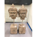 A PAIR OF STONE BUDDHA HEADS