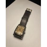 A FASHION WRIST WATCH SEEN WORKING BUT NO WARRANTY