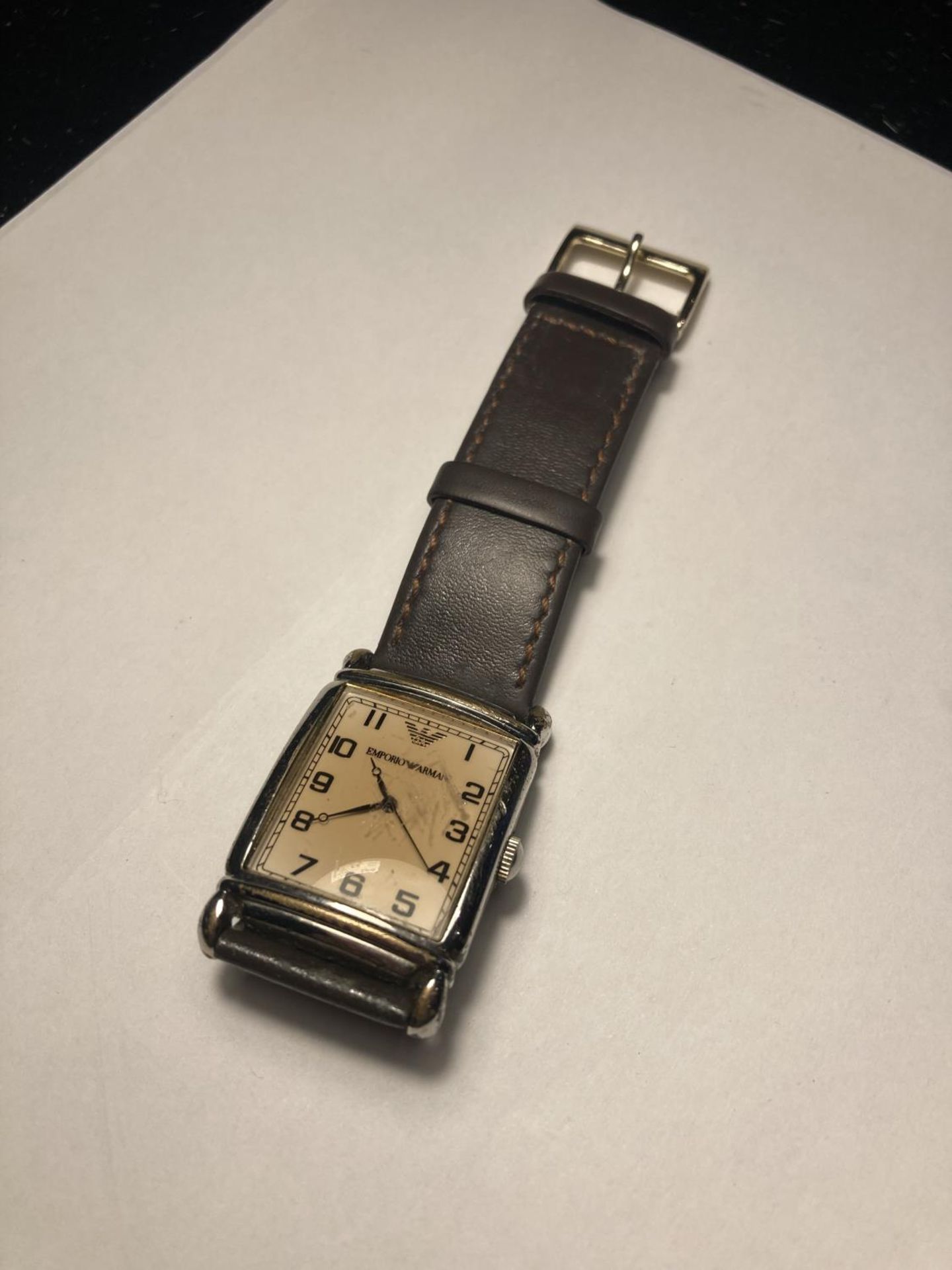 A FASHION WRIST WATCH SEEN WORKING BUT NO WARRANTY