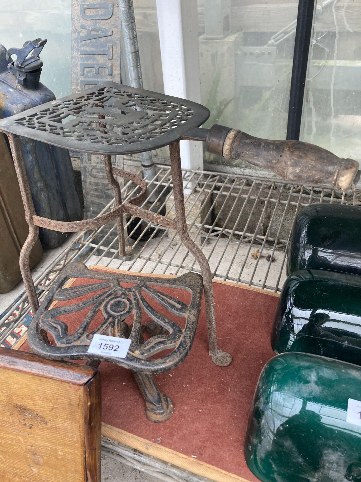 TWO VINTAGE METAL TRIVET STANDS