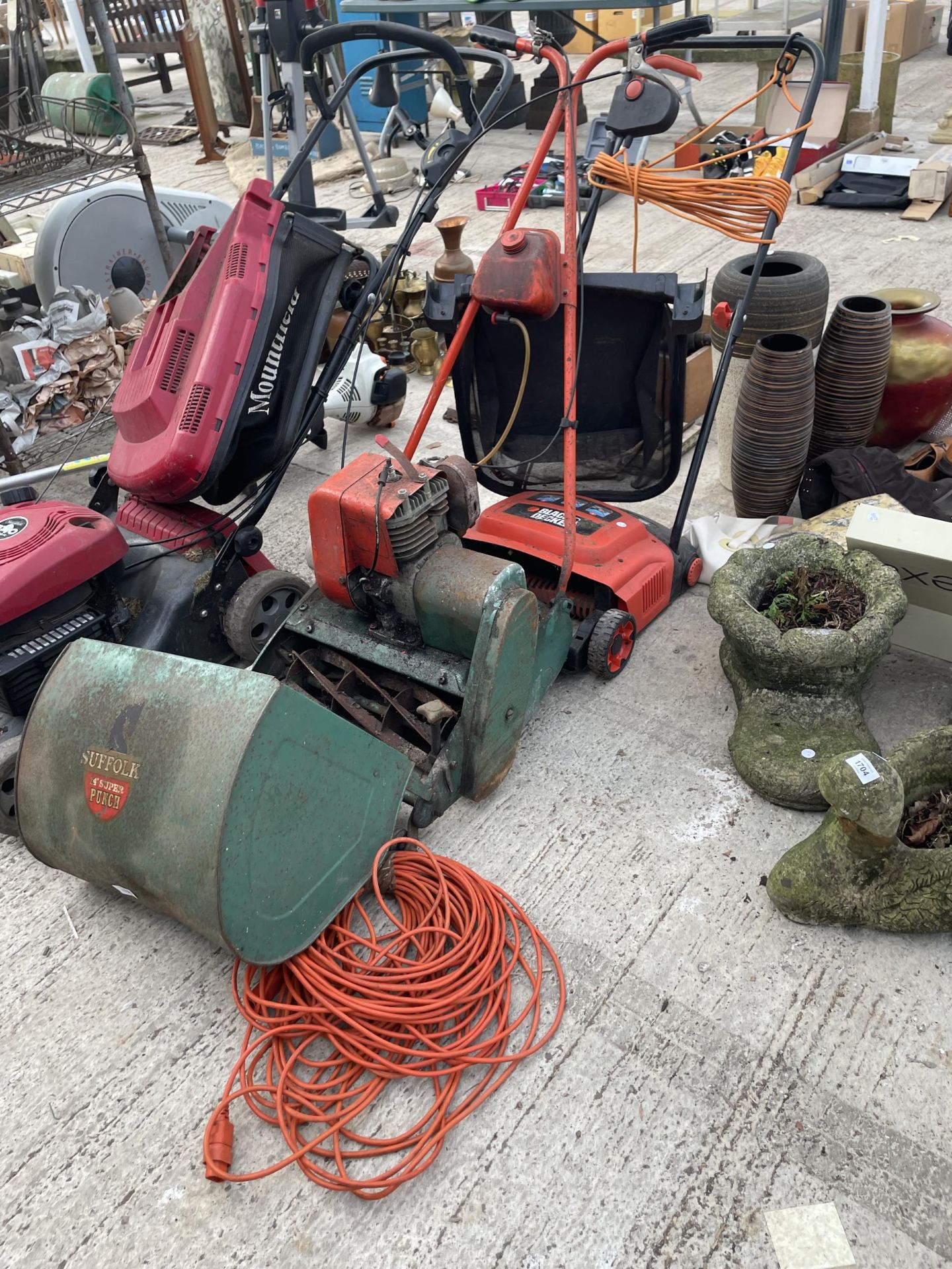 AN ELECTRIC BLACK AND DECKER LAWN MOWER AND A SUFFOLK PUNCH ROTARY LAWN MOWER