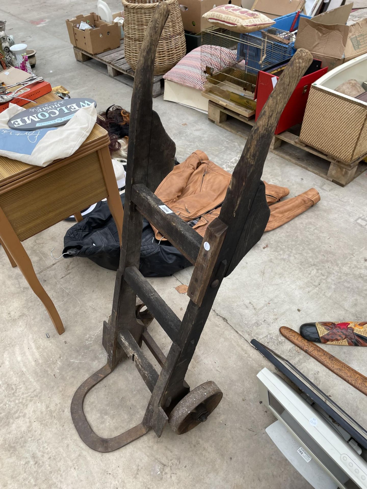 A VINTAGE WOODEN AND METAL TWO WHEELED SACK TRUCK