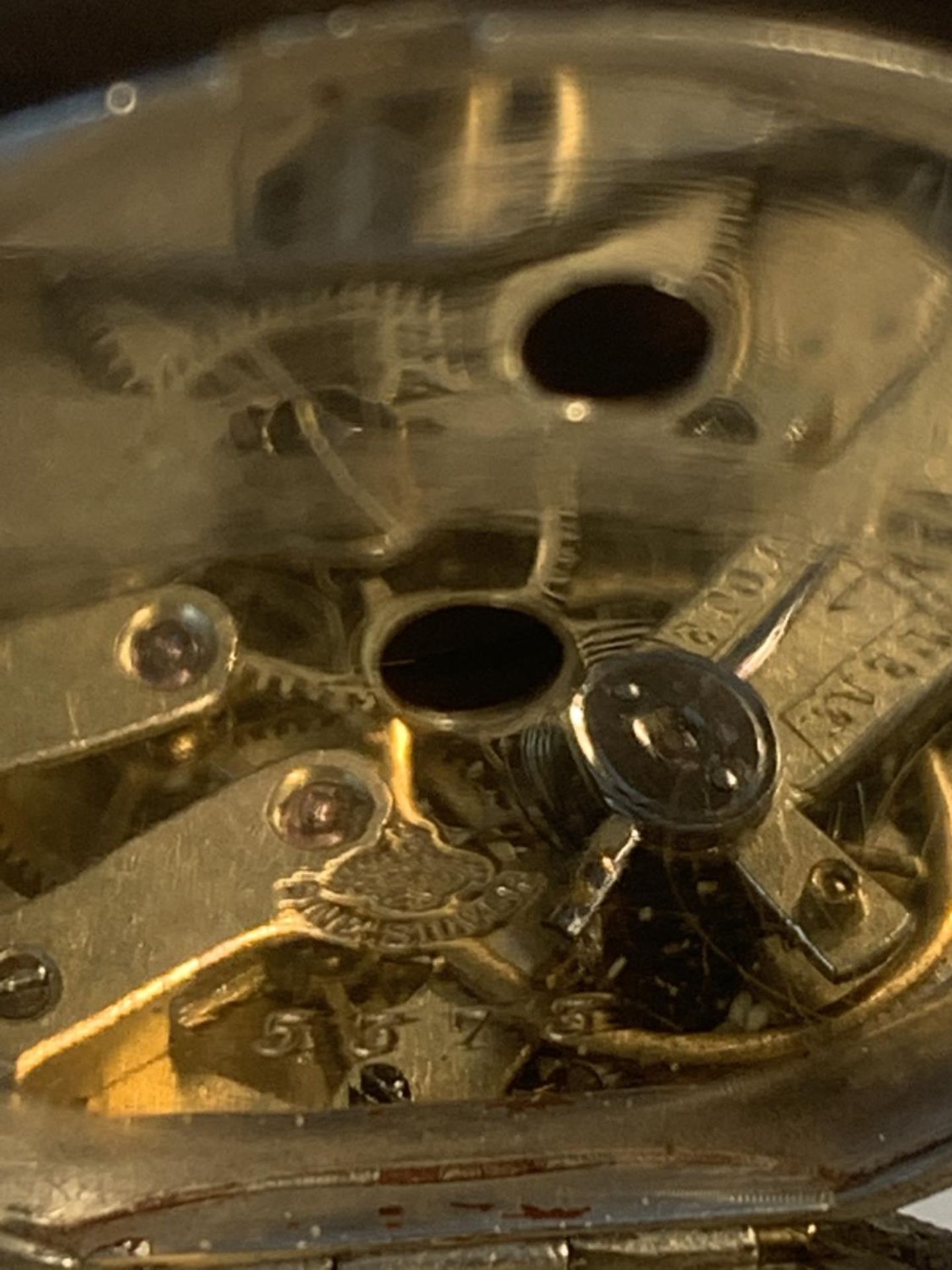 A MARKED FINE SILVER POCKET WATCH WITH DECORATIVE FACE AND A CHAIN - Image 6 of 6