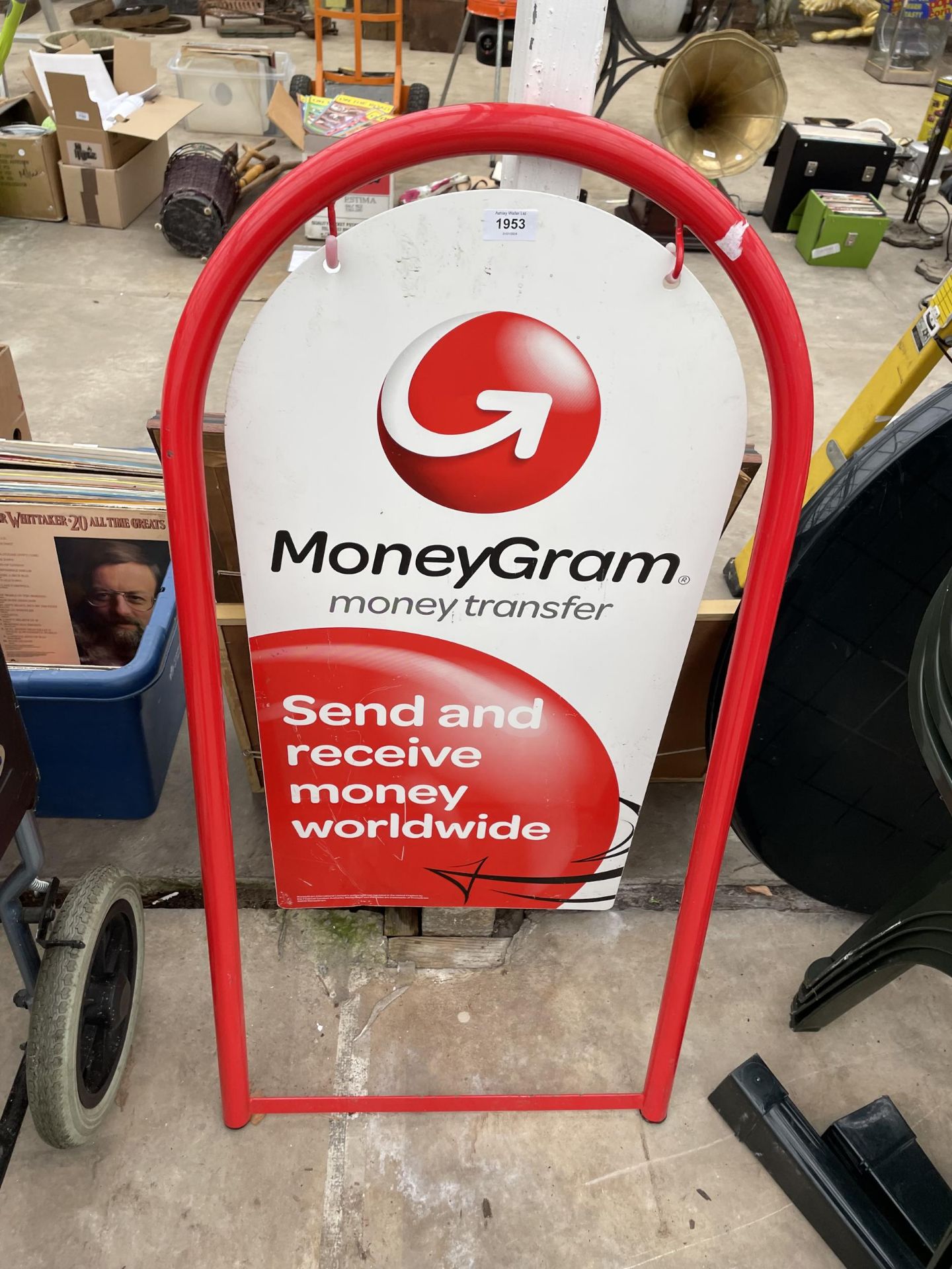 A 'MONEYGRAM' SWINGING SIGN