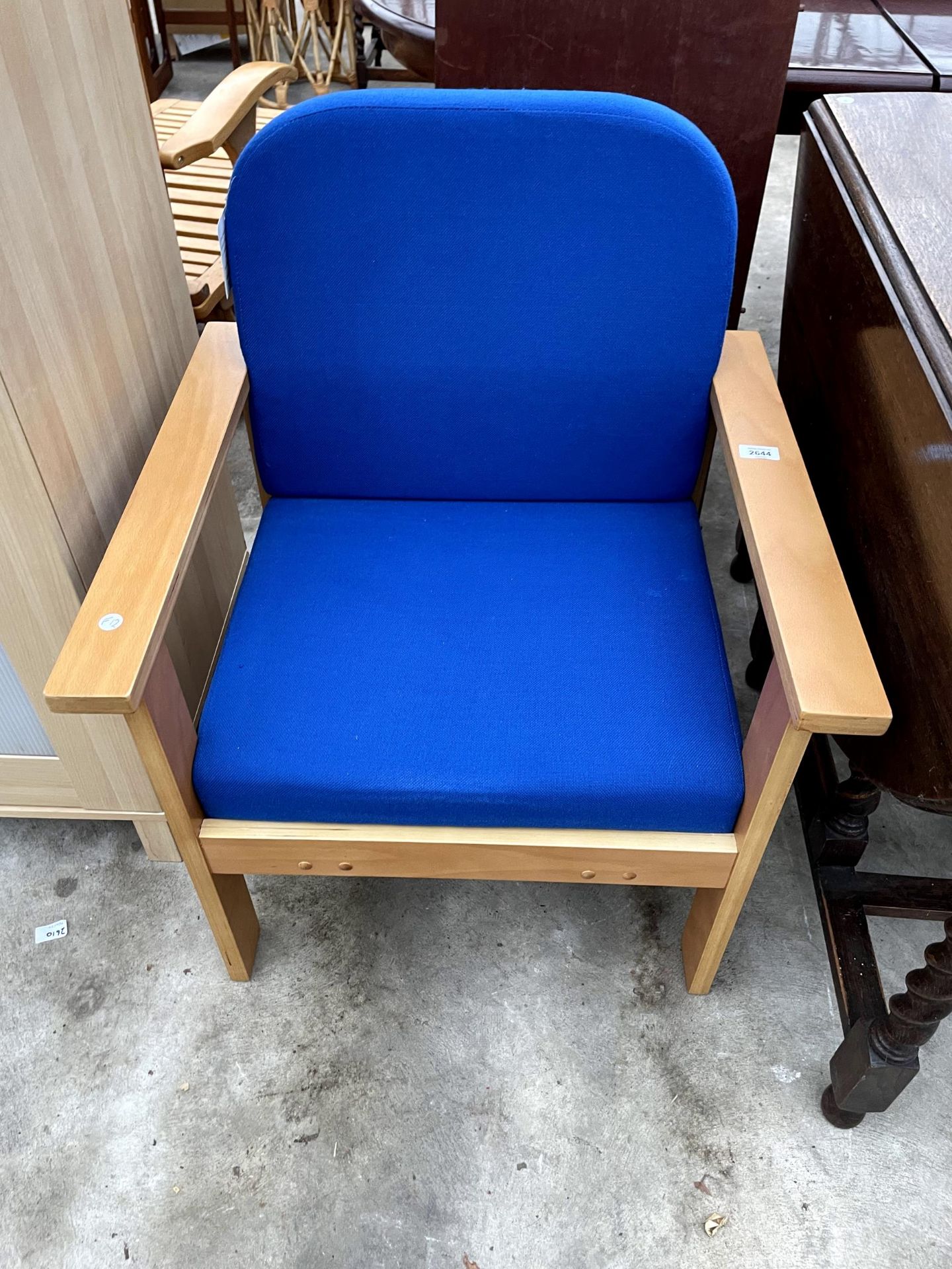 A MODERN OFFICE EASY CHAIR IN ROYAL BLUE