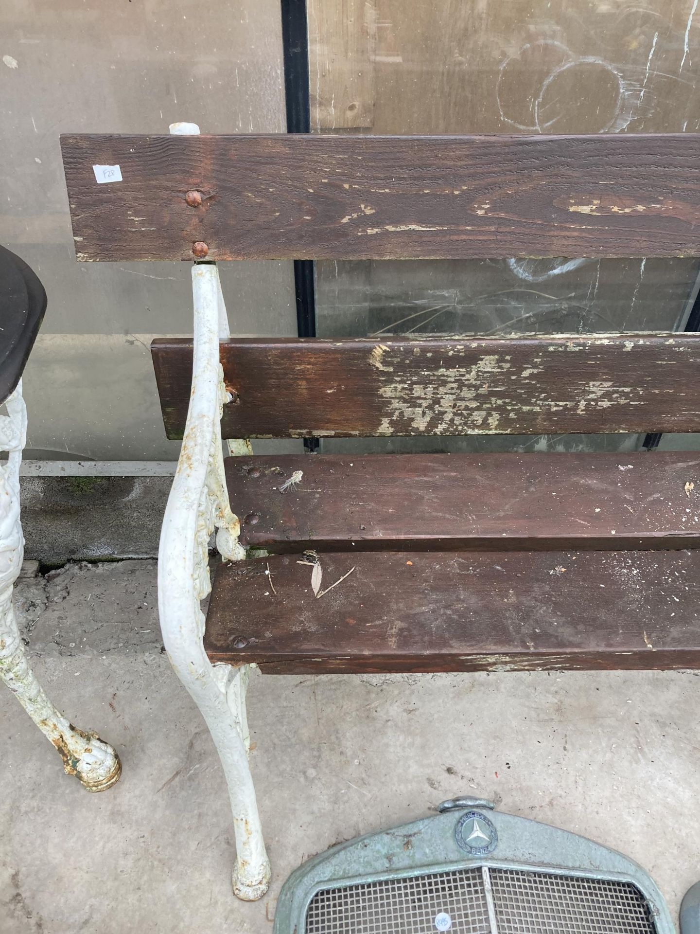 A VINTAGE WOODEN PLANK GARDEN BENCH WITH DECORATIVE CAST BENCH ENDS - Image 4 of 5