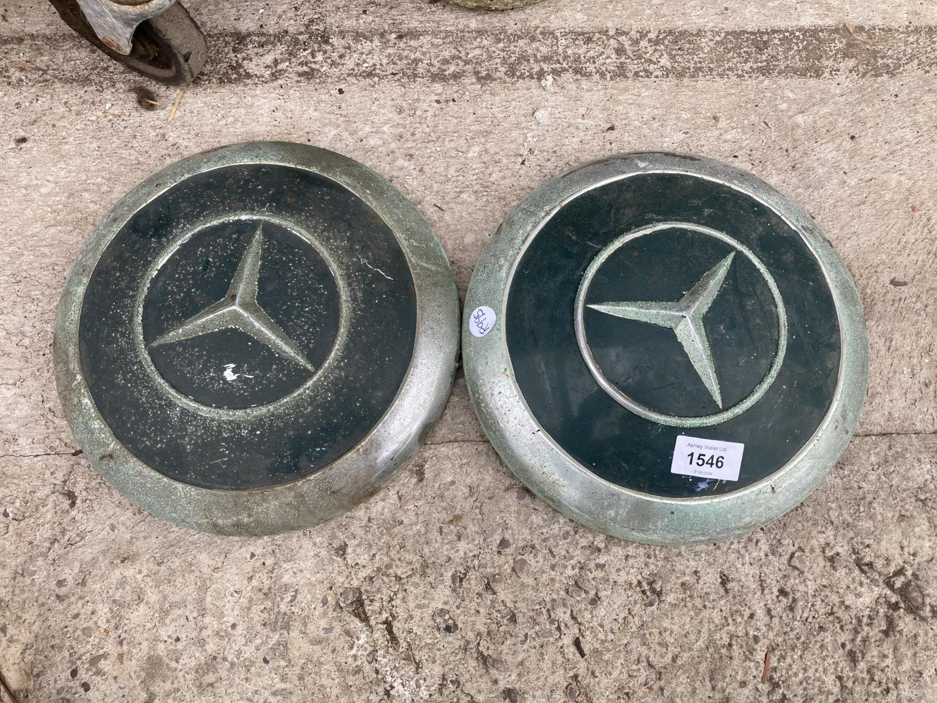 TWO VINTAGE MERCEDES BENZ HUB CAPS