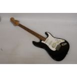 A SQUIER STRAT FENDER ELECTRIC GUITAR