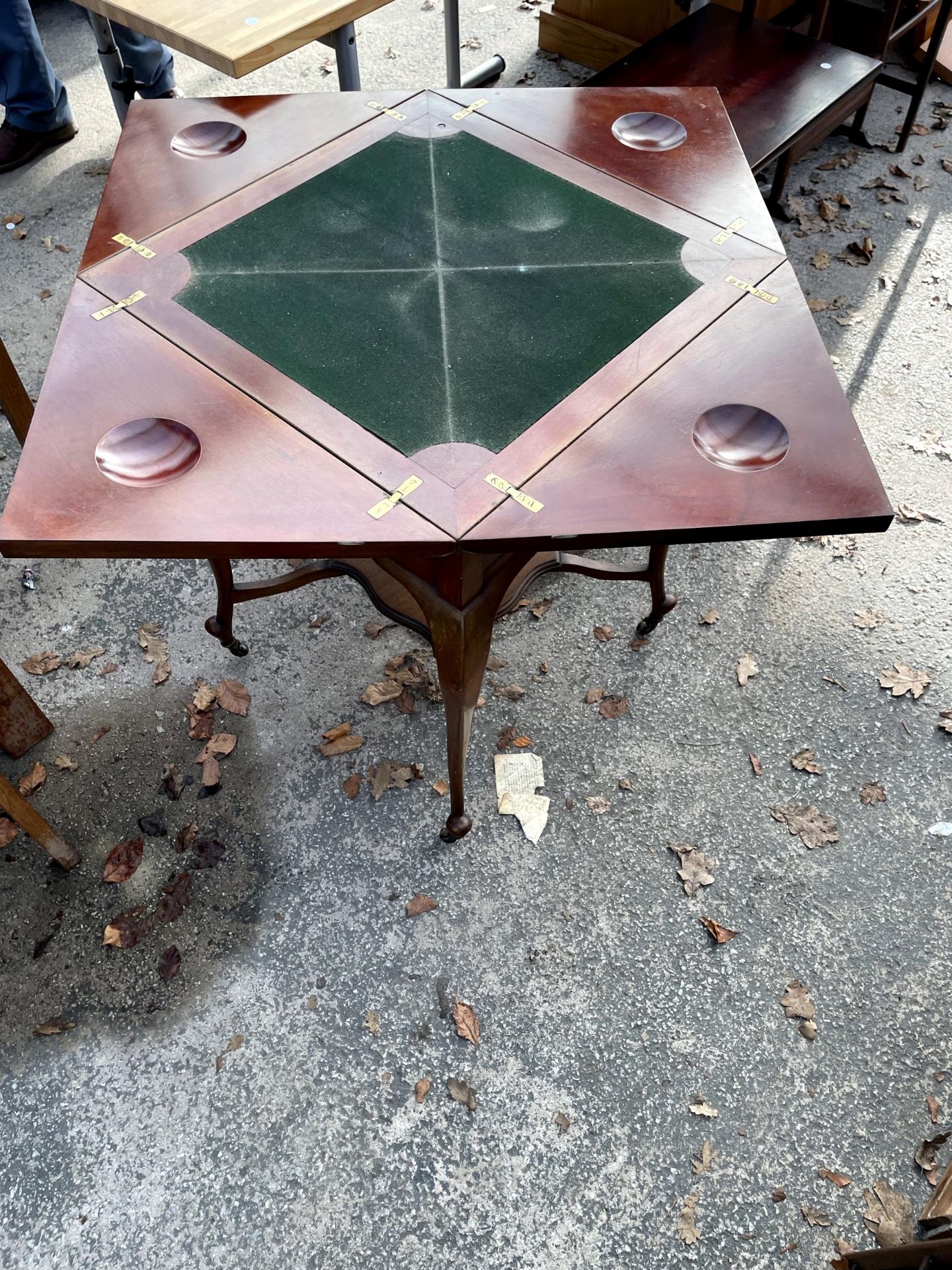 A LATE VICTORIAN MAHOGANY ENVELOPE CARD TABLE WITH SINGLE DRAWER AND UNDER SHELF