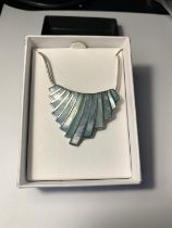 A SILVER DECO NECKLACE IN A PRESENTATION BOX