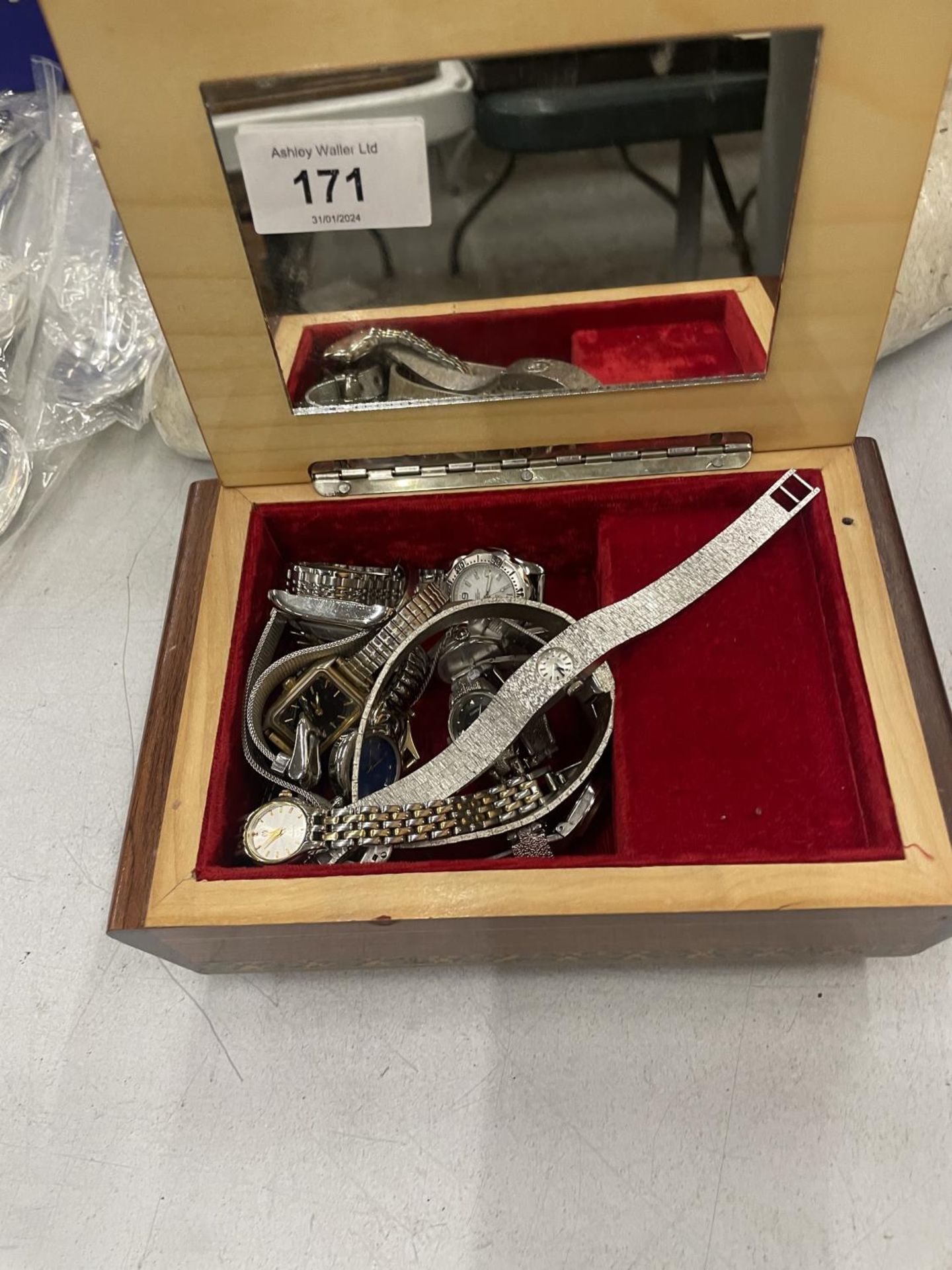 AN INLAID JEWELLERY BOX CONTAINING A QUANTITY OF LADIES WRISTWATCHES