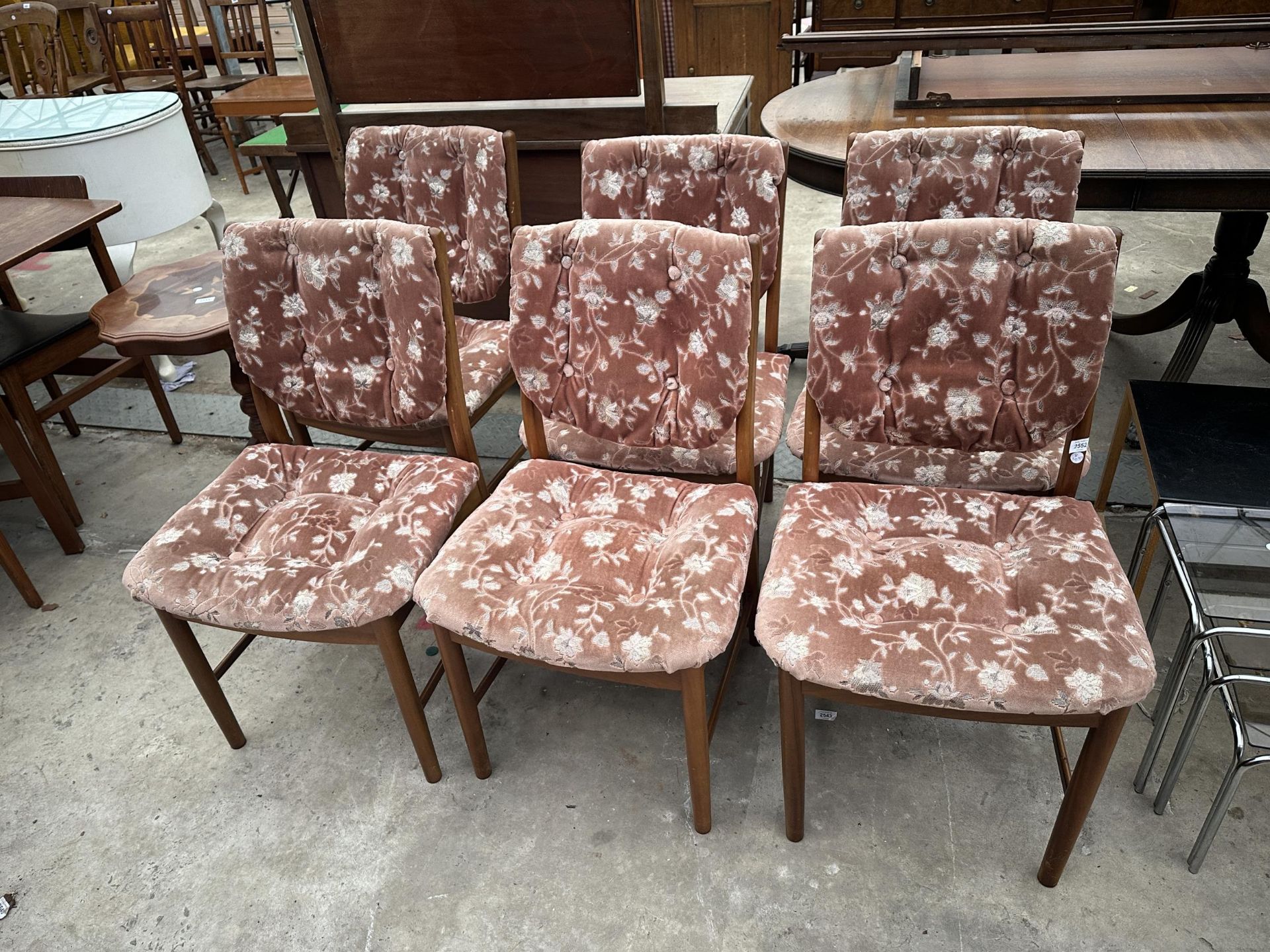 A SET OF SIX RETRO TEAK UPHOLSTERED DINING CHAIRS