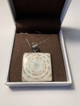 A SILVER NECKLACE WITH LARGE SQUARE STONE PENDANT IN A PRESENTATION BOX