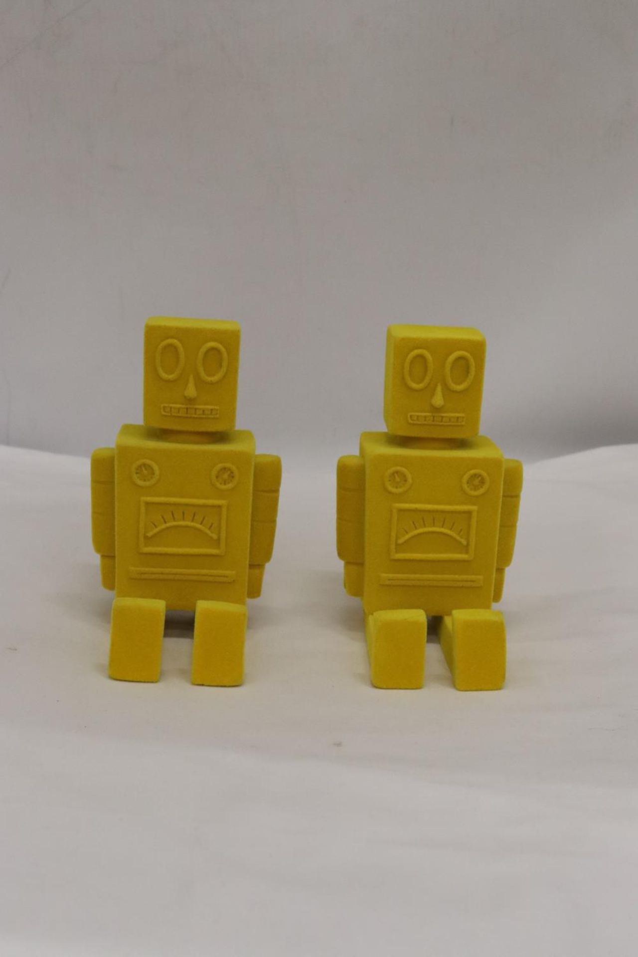 A PAIR OF ROBOT BOOKENDS