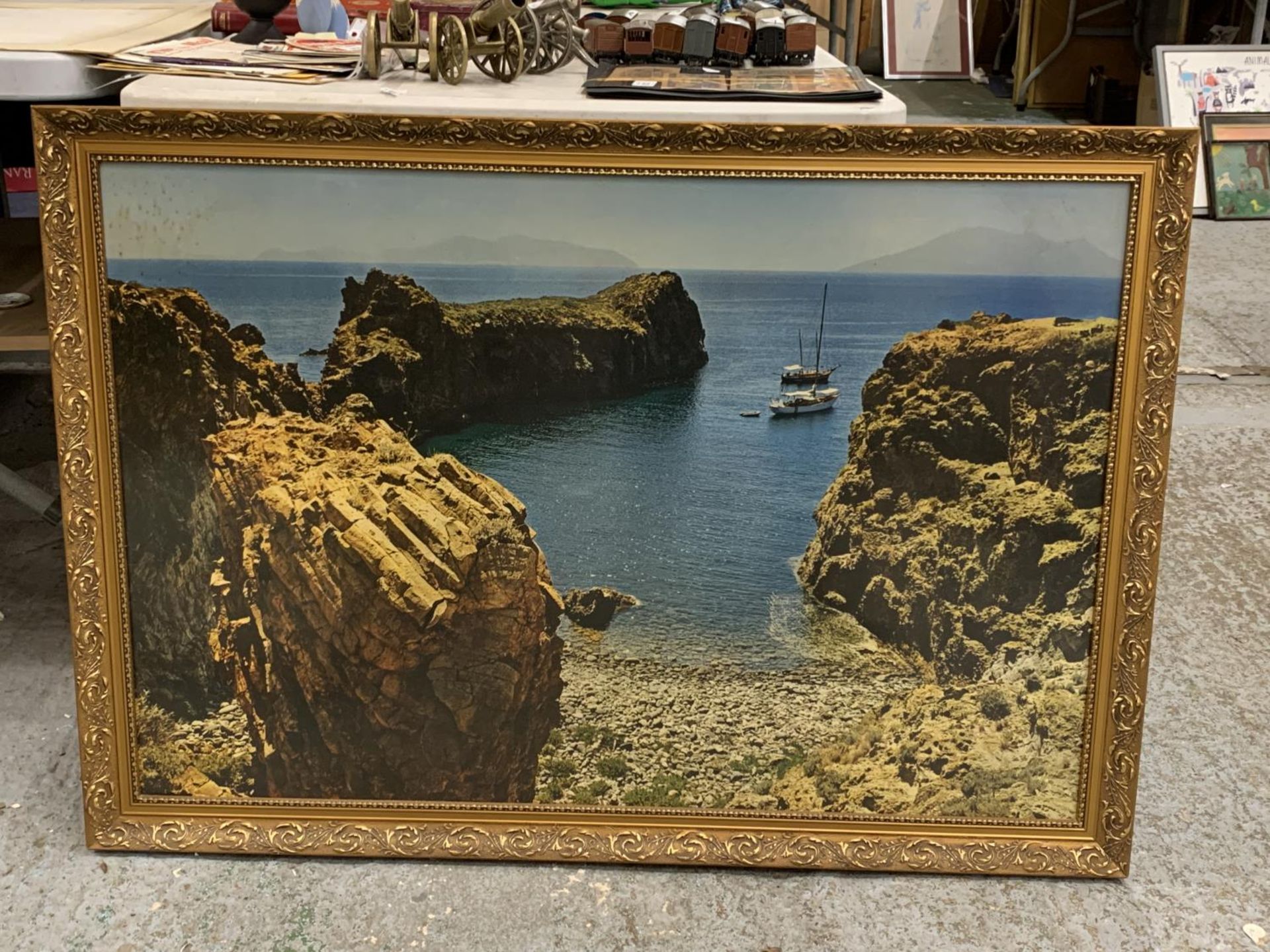 A LARGE FRAMED PRINT OF BOATS NEAR A BEACH - Image 5 of 7