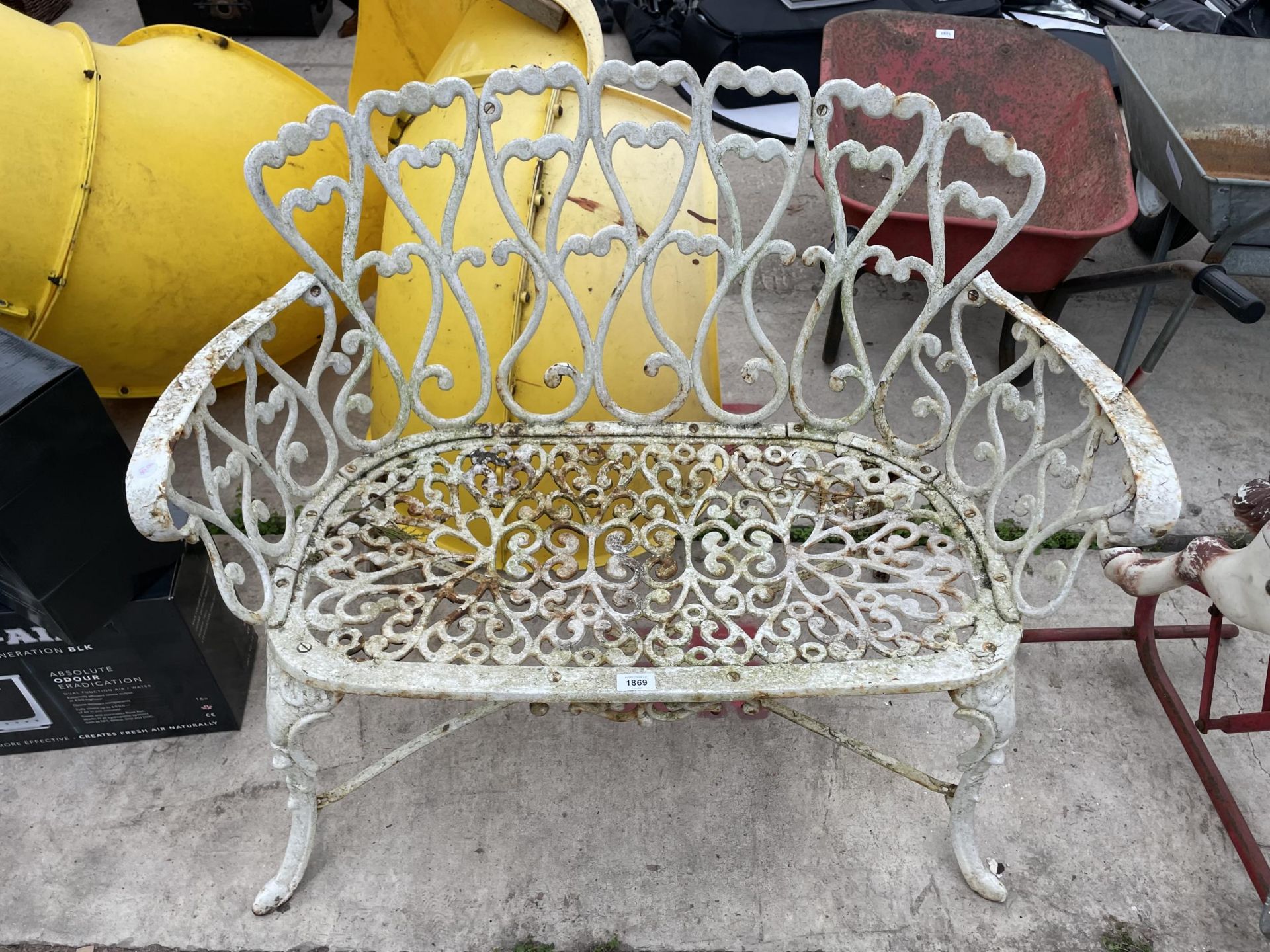 A VINTAGE WHITE PAINTED METAL TWO SEATER GARDEN BENCH