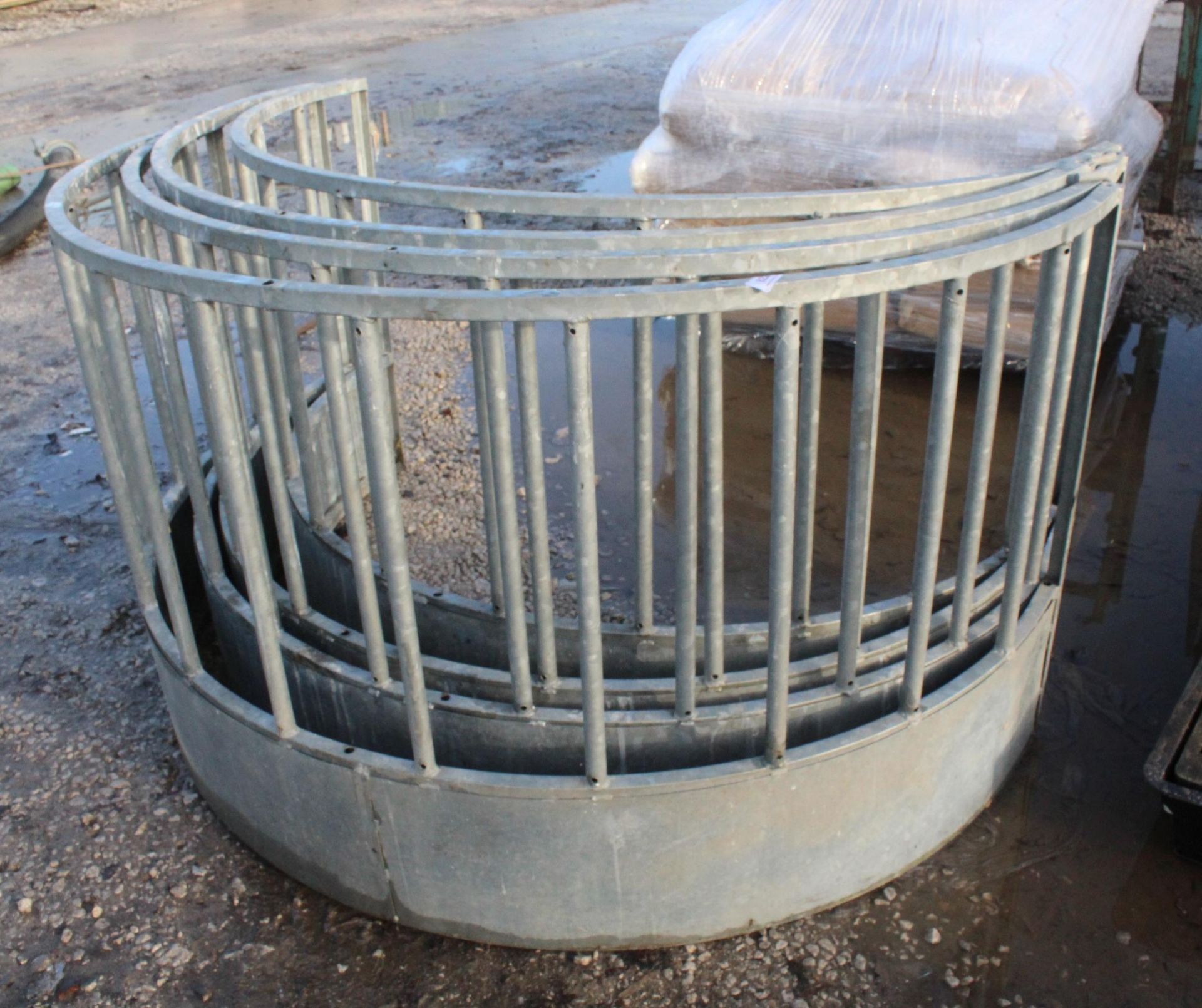 TWO ROUND SHEEP FEEDERS + VAT