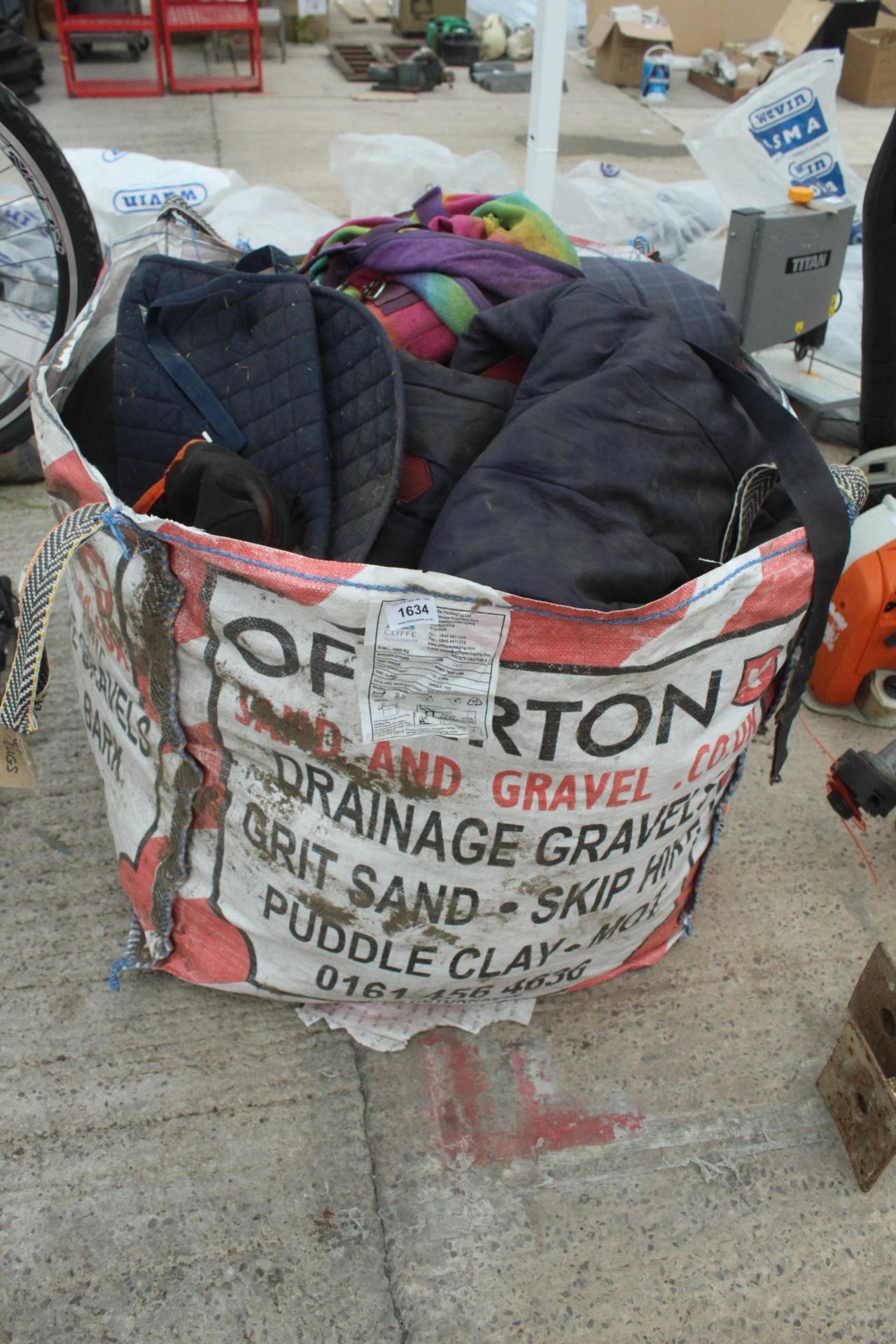 A BAG OF HORSE RUGS ETC NO VAT