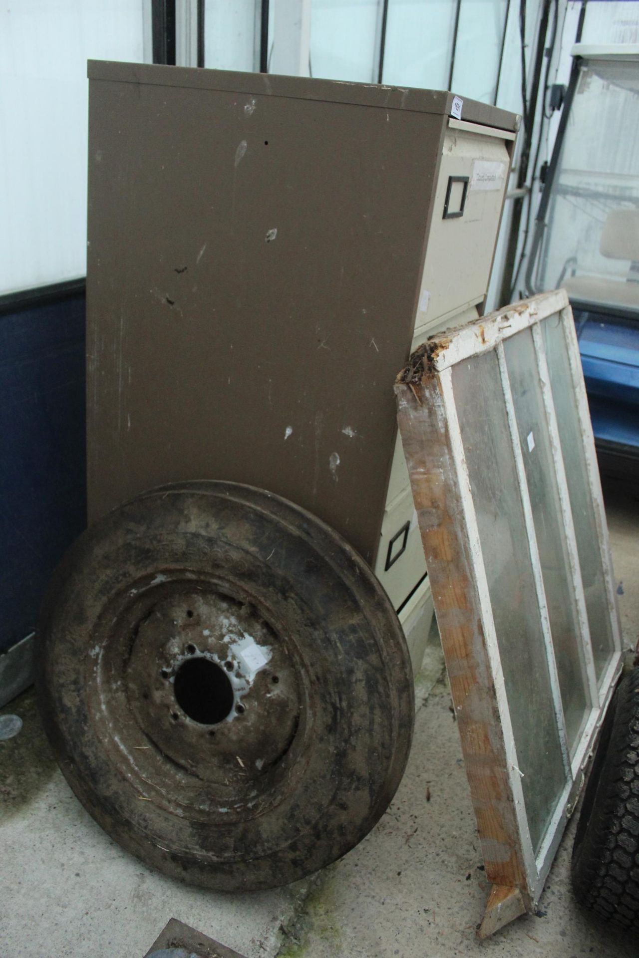 WHEEL, WINDOW AND FILING CABINET + VAT - Image 2 of 2