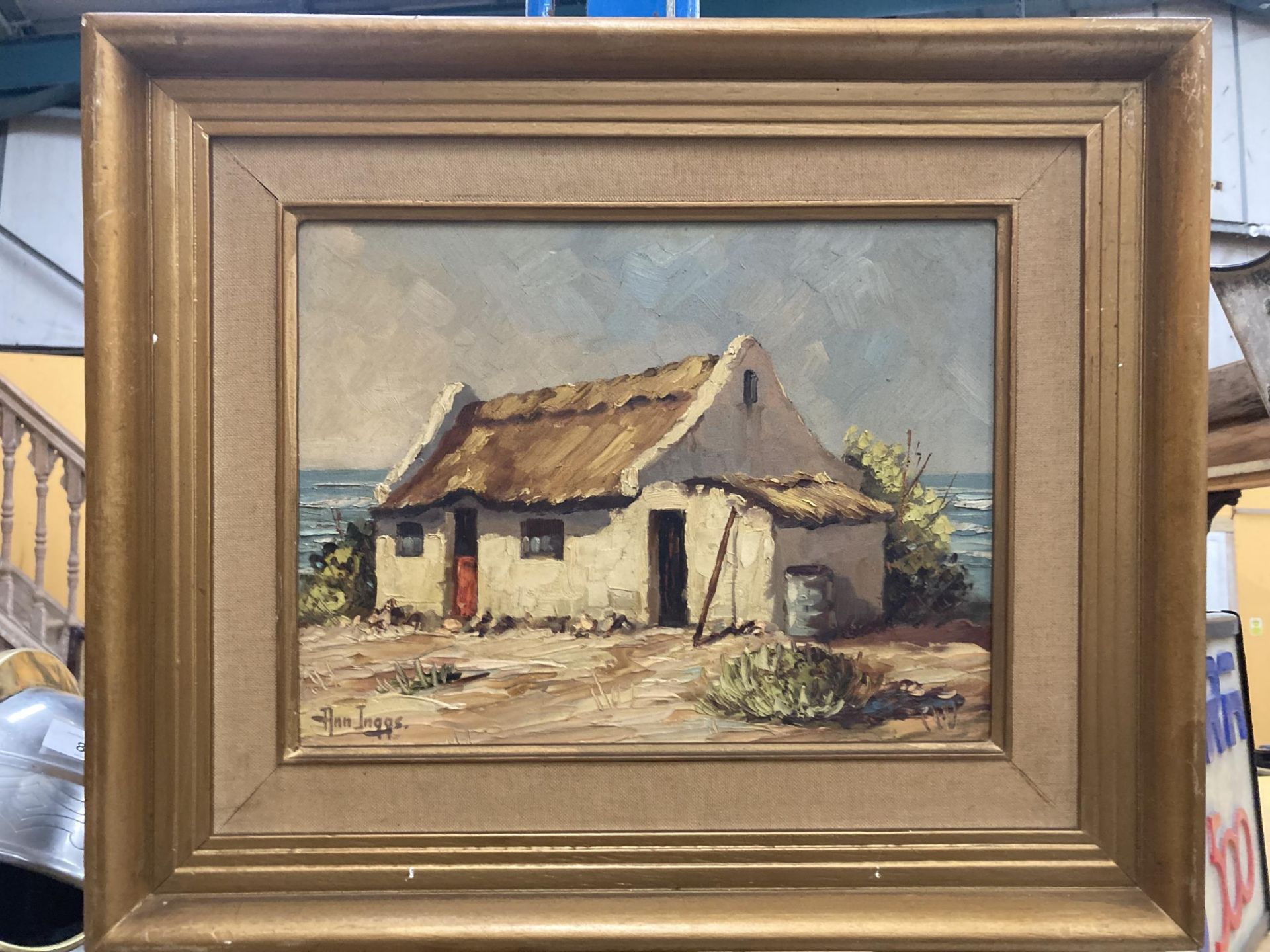 AN ANN INGGS 1936 SOUTH AFRICA FRAMED OIL PAINTING OF A HOUSE BY THE SEA