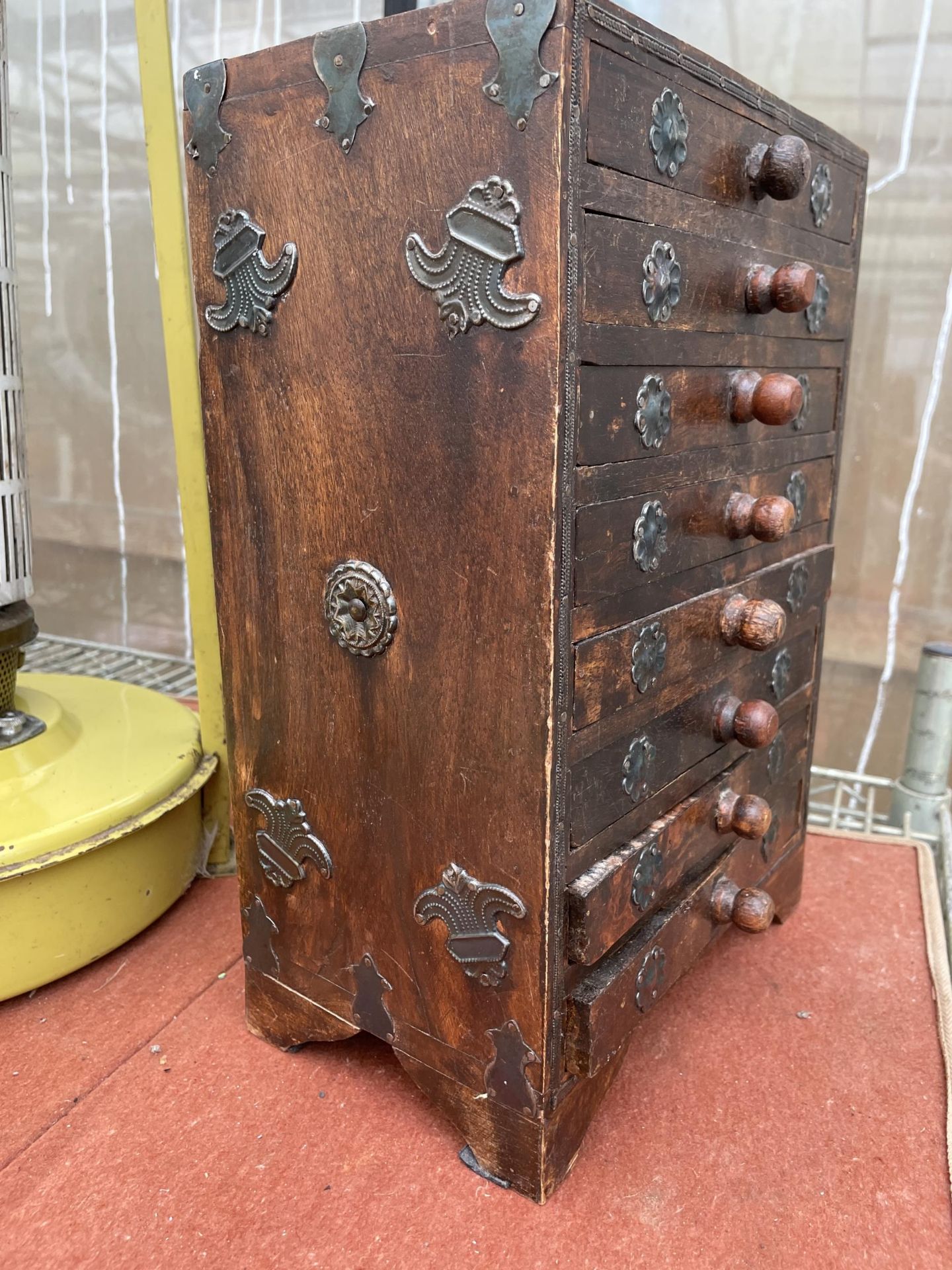 A MINIATURE INDIAN HARDWOOD CHEST OF EIGHT DRAWERS - Image 6 of 6