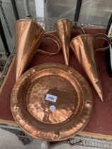 THREE VINTAGE COPPER ALE MEASURES AND A COPPER CHARGER