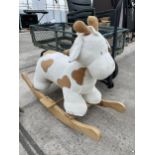 A CHILDS PLUSH ROCKING HORSE