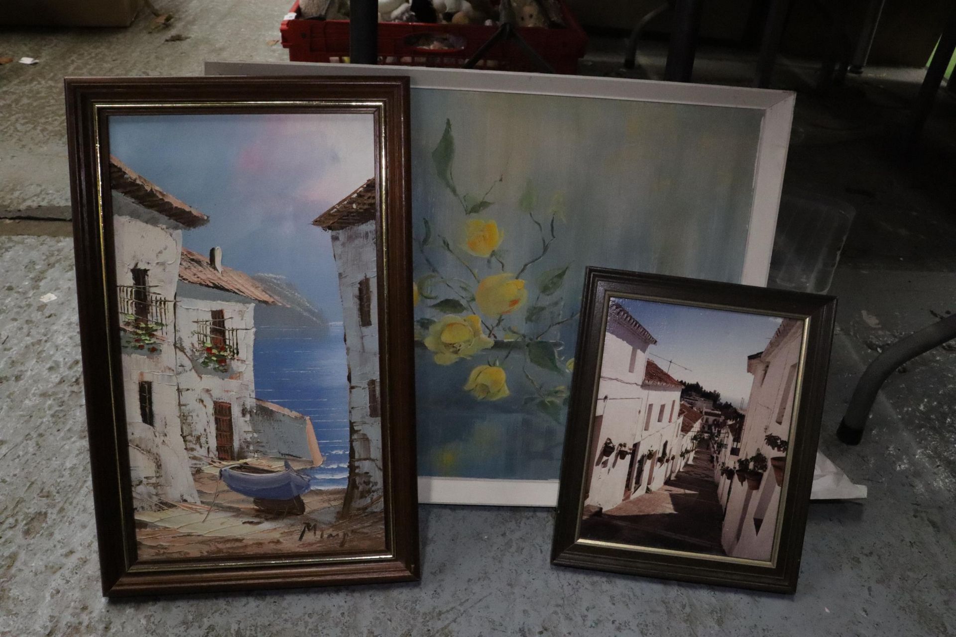 AN OIL ON BOARD OF A ROSE BOWL WITH ROSES, A CONTINENTAL SCENE AND A PRINT OF A STREET SCENE