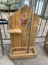 A DECORATIVE WOODEN WALL SHELF WITH LOWER PLANTER