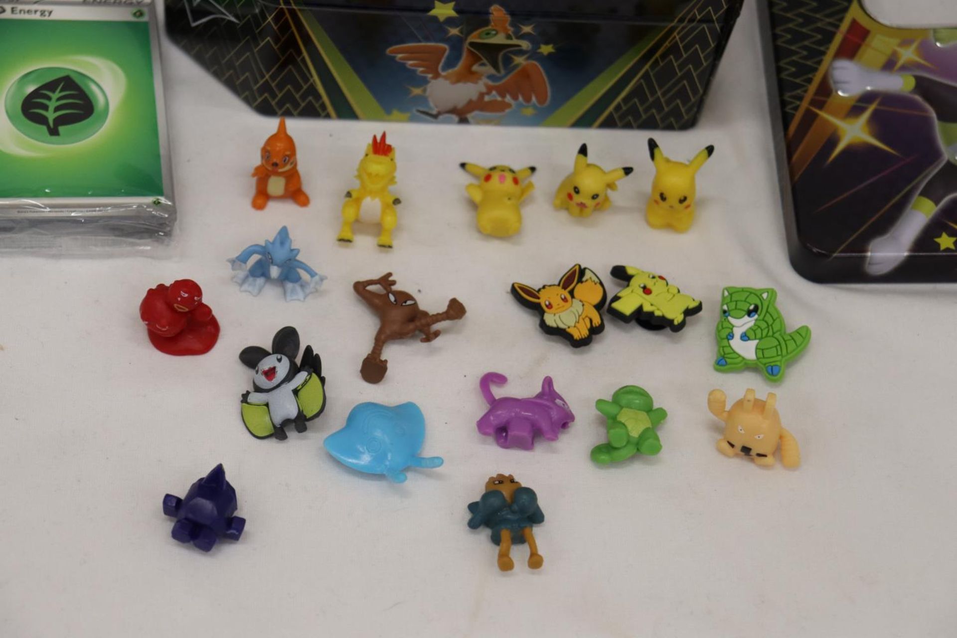 A TIN FULL OF POKEMON, TOYS, STICKERS AND CHARMS - Image 3 of 5