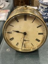 A VINTAGE BRASS ROUND DASHBOARD CLOCK