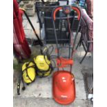 AN ELECTRIC FLYMO AND TWO ELECTRIC KARCHER PRESSURE WASHERS